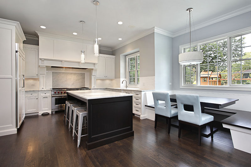 Shades Created Between Deep Natural Hardwood And Wall And Cabinets Gives A Subtle Hint Of Elegance